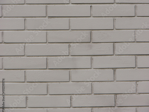 Close-up shot of a grey brick wall