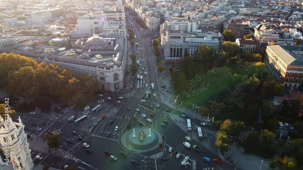 Drone flight over the Cibeles Fountain with a distant view of Madrid.