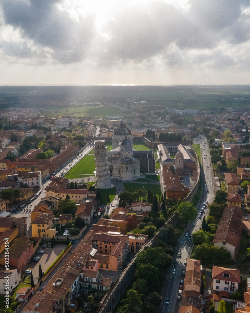 Pisa, Tuscany - 25 April 2022: Aerial view of Piazzale dei Miracoli with Pisa Leaning tower, Tuscany, Italy. Pisa, Tuscany - 25 April 2022: Aerial view of Piazzale dei Miracoli with Pisa Leaning tower, Tuscany, Italy.