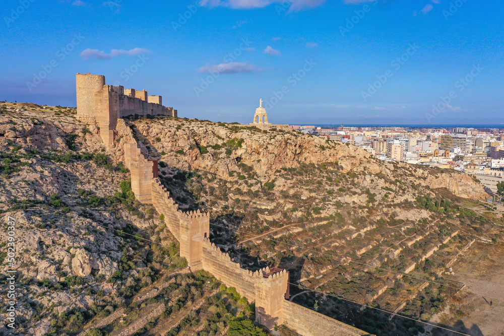 Aerial view of Muralla de Jairán connecting the fortress and the monument of Cerro San Cristobal in Almería, Andalusia, Spain. Aerial view of Muralla de Jairán connecting the fortress and the monument of Cerro San Cristobal in Almería, Andalusia, Spain.
