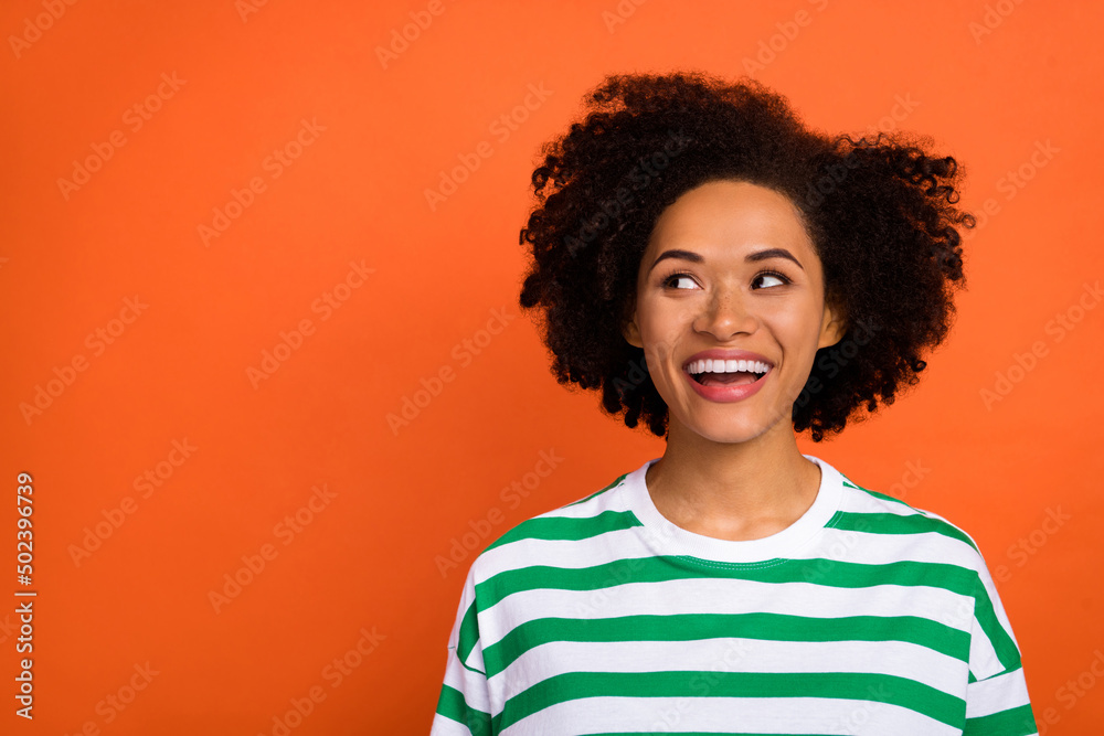 Portrait of attractive amazed cheerful girl creating solution copy space isolated over bright orange color background Portrait of attractive amazed cheerful girl creating solution copy space isolated over bright orange color background