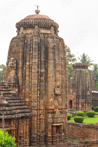 Beautiful shot of the Lingaraja Temple under the cloudy skies in India photo