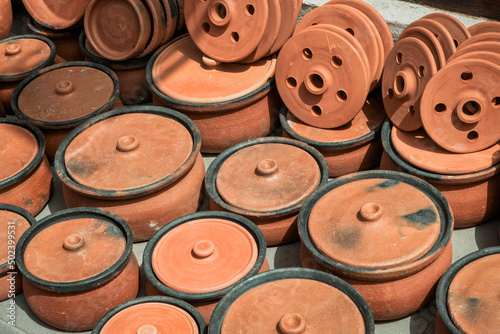 Traditional Anatolian clay pottery sold for sale in a shop at bazaar in Istanbul, Turkey. Group of earthenware.