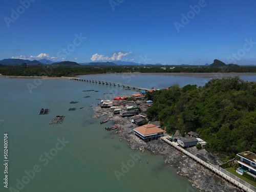 Beautiful view of the green shore and the sea. Ko Raet, Thailand. photo