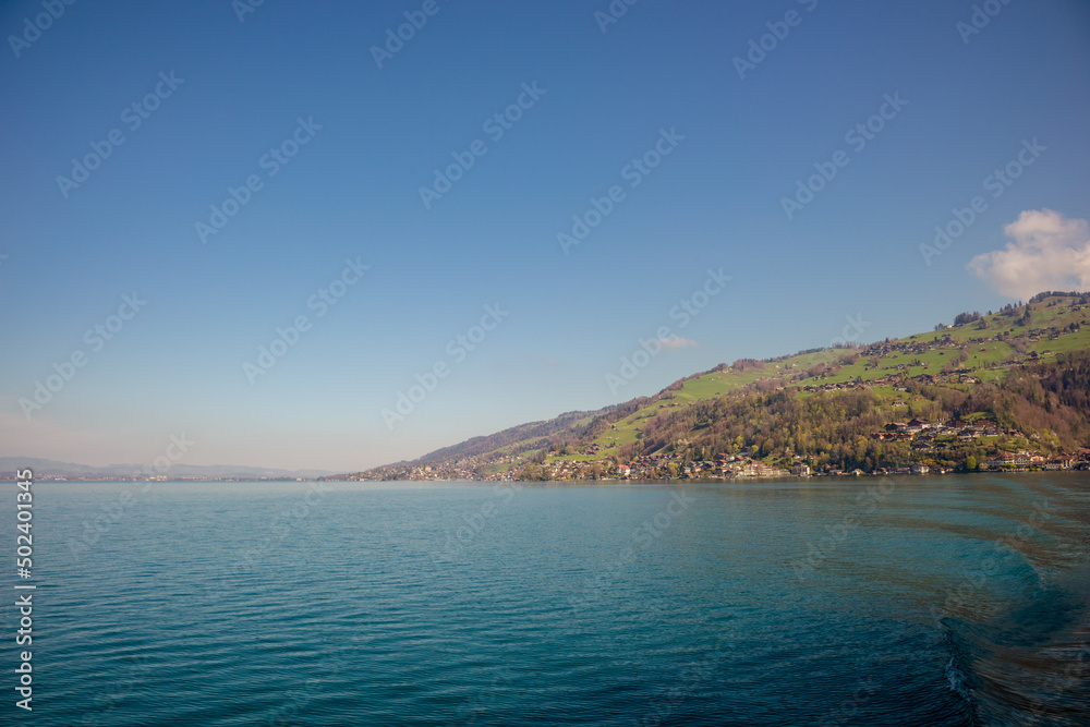 Switzerland wonderful spring landscape with lakes and high mountains and a bright sky in the morning beautiful natural landscape.