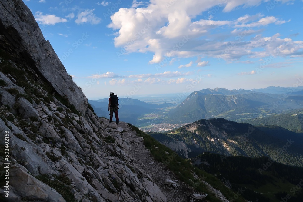 Climbing a via ferrata on the German Alps
