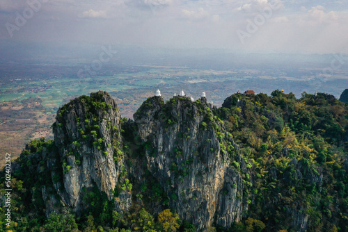 Aerial view of Wat Chaloem Phra Kiat Phrachomklao Rachanusorn, sky pagodas on top of mountain in Lampang Thailand photo