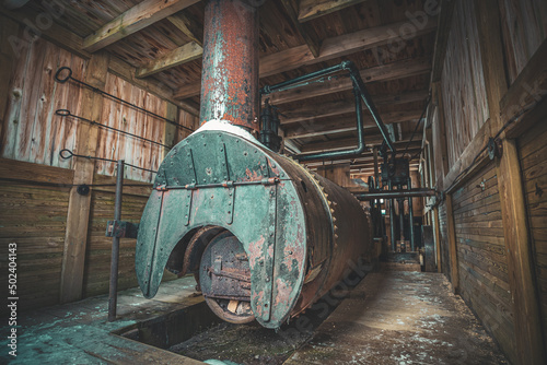 Fototapeta Closeup shot of a rusty steam engine
