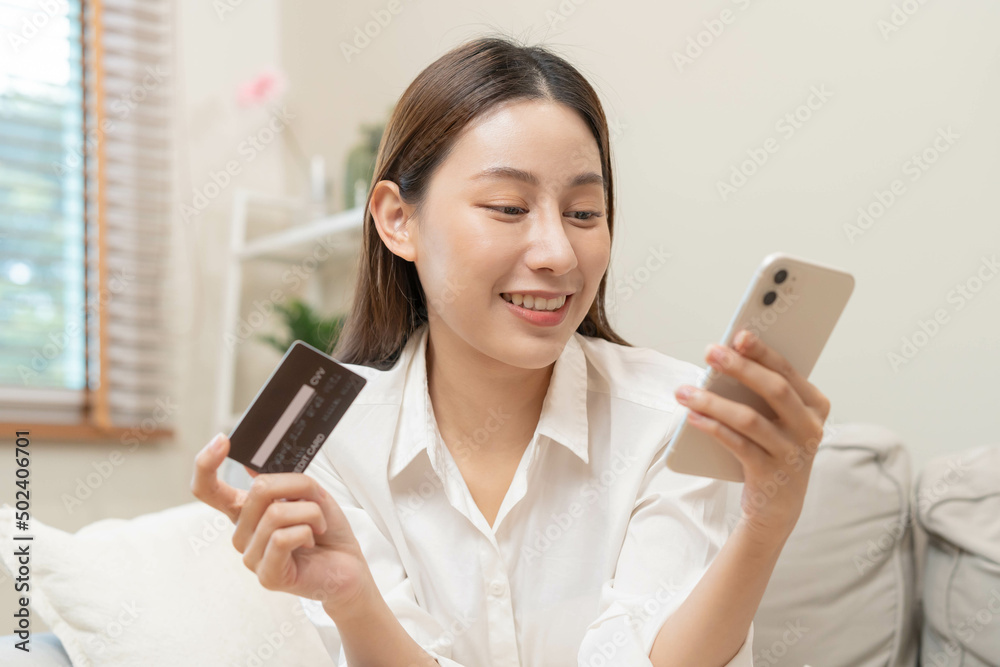 Online internet banking, asian young woman hand in payment spending by scan qr code, use phone, mobile to transfer money or pay money of credit card without cash at home. Technology of financial. Online internet banking, asian young woman hand in payment spending by scan qr code, use phone, mobile to transfer money or pay money of credit card without cash at home. Technology of financial.
