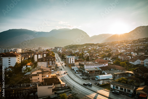 Sun setting over city of Pejë, Kosovo