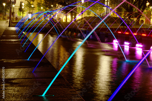 Beautiful view of the fountain in Litewski Square in Lublin, Poland, captured at night photo