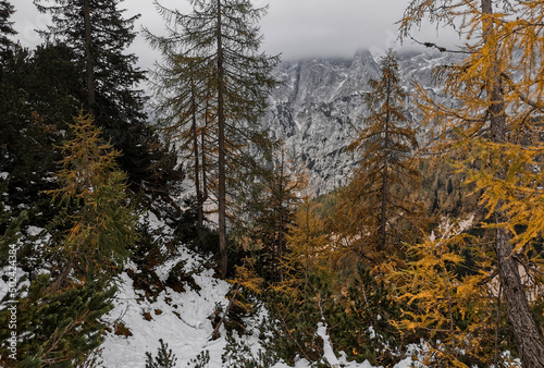 Mesmerizing autumnal views of the Vrsic mountains pass in Julain alps in Slovenia photo