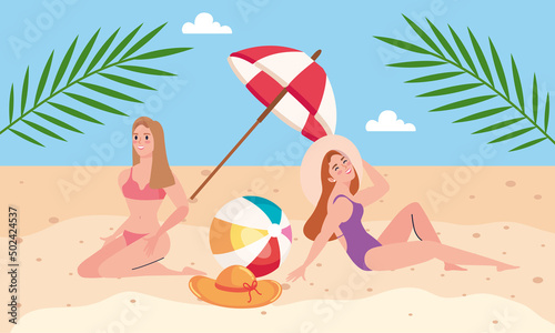 girls couple tanning on the beach