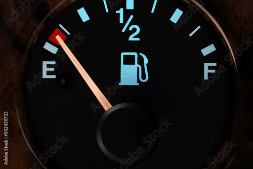 fuel gauge in car dashboard in illuminated night mode  - empty photo