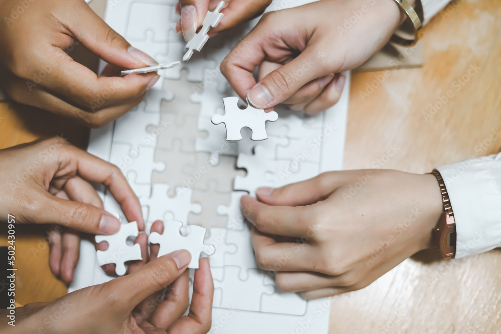business strategy ideas Business team planning a strategic meeting Assembling jigsaw pieces, using jigsaw puzzles, showing solutions for business people, teamwork.
business strategy ideas Business team planning a strategic meeting Assembling jigsaw pieces, using jigsaw puzzles, showing solutions for business people, teamwork.