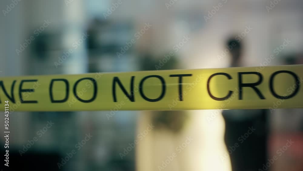 Yellow tape securing crime scene, police department investigating ...