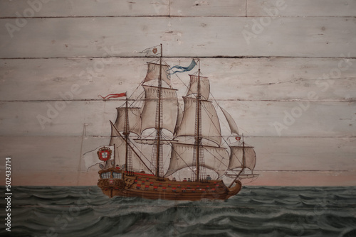 Beautiful fresco painting of a boat in Descobrimentos, Portugal