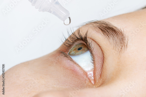 Cropped shot of a woman dripping her eyes with medicinal drops natural tear Fototapet