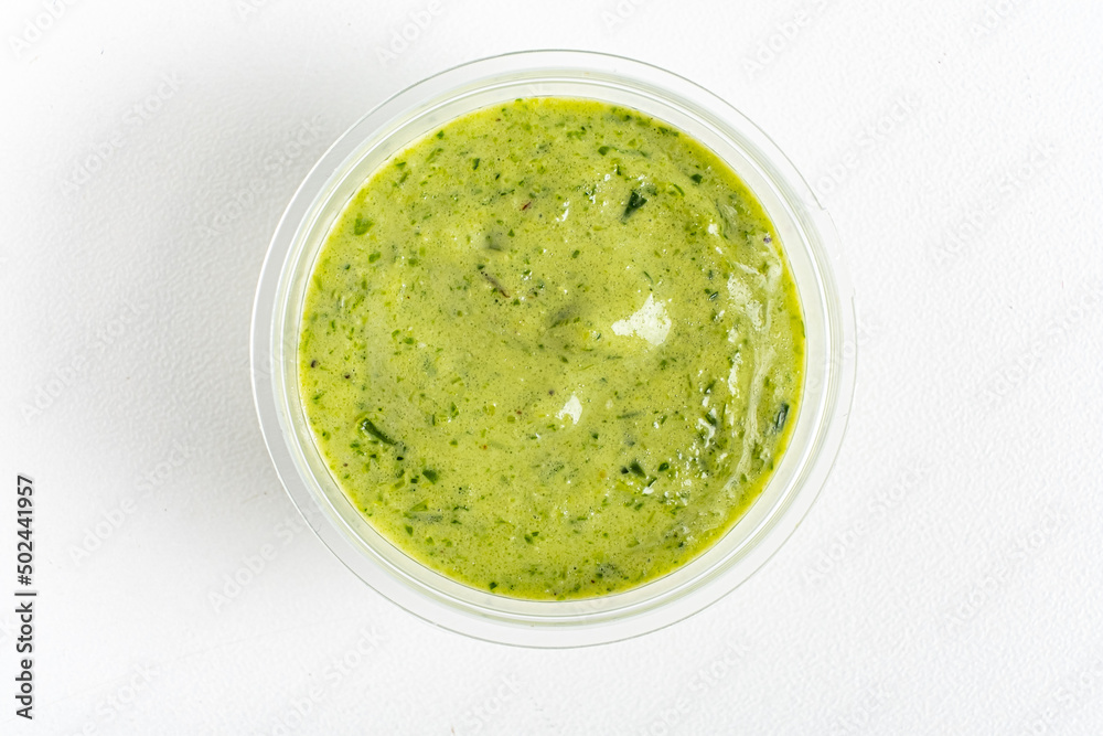 green sauce dip on white green sauce dip on white