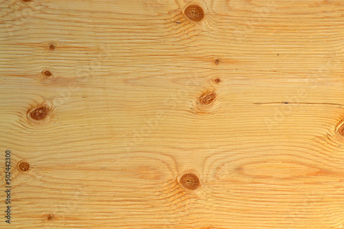 Brown wood wall. Old and beautiful background. Natural pattern for design. Grunge background. Peeling paint on an old wooden wall. Rustic style wallpaper. Timber texture. 