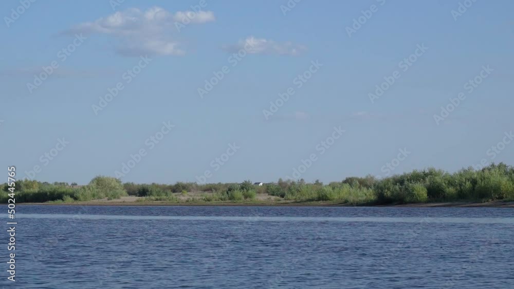 Summer landscape with a running river, copy space. Summer day Summer landscape with a running river, copy space. Summer day