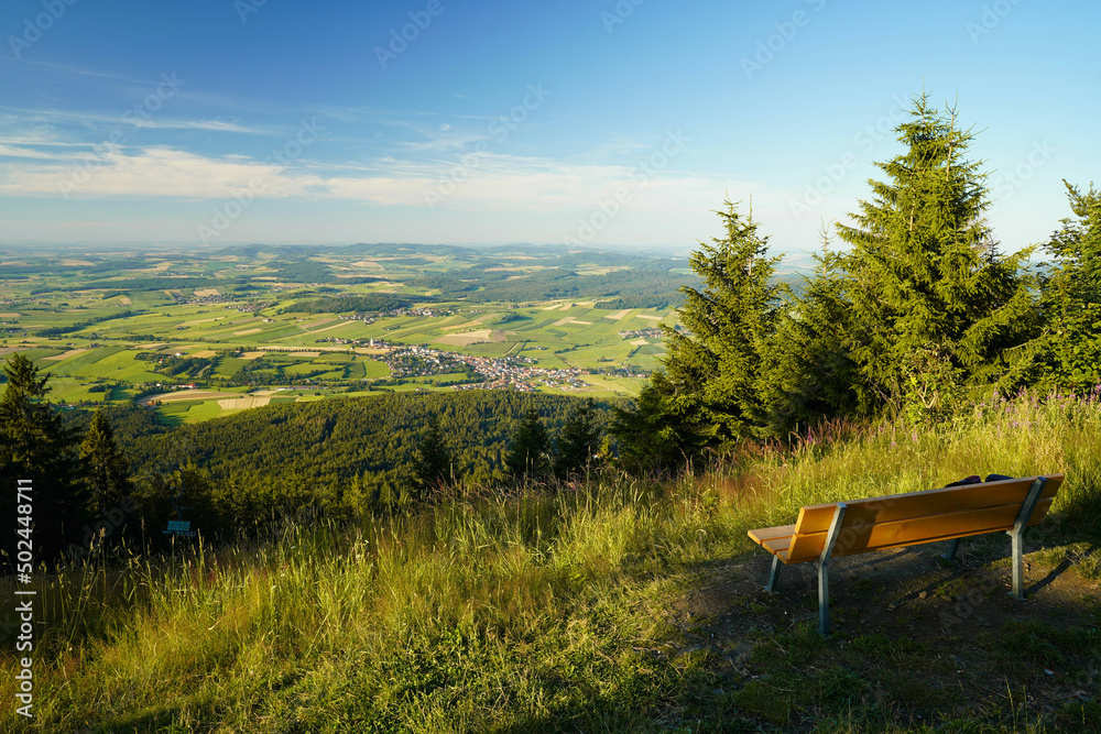 View from mount Hohenbogen to Neukirchen Heiligblut, a small town in the Bavarian Forest. View from mount Hohenbogen to Neukirchen Heiligblut, a small town in the Bavarian Forest.