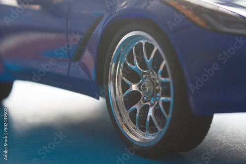 Toy car in vivid blue color © lijphoto