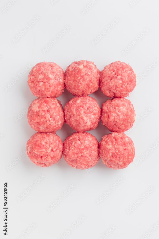 Top view of raw meat balls isolated on white Top view of raw meat balls isolated on white