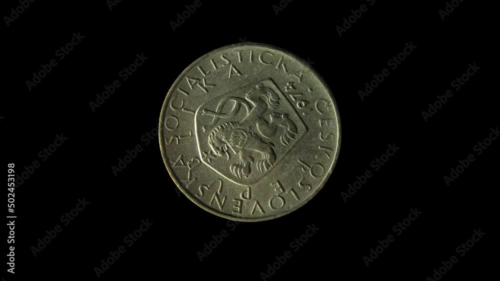 Obverse of Czechoslovakia coin 5 korun 1974 with inscription meaning Czechoslovak Socialist Republic. Isolated in black background. Obverse of Czechoslovakia coin 5 korun 1974 with inscription meaning Czechoslovak Socialist Republic. Isolated in black background.