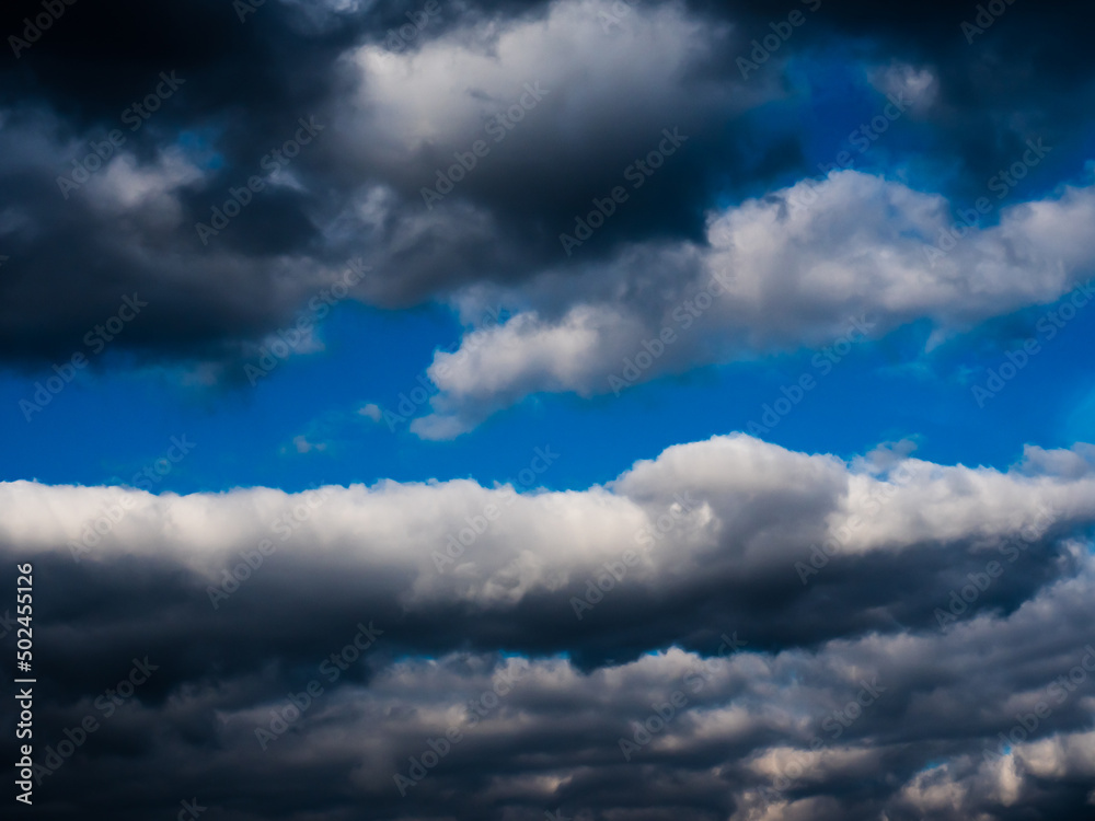 Obraz premium blue sky with lots of soft and fluffy clouds