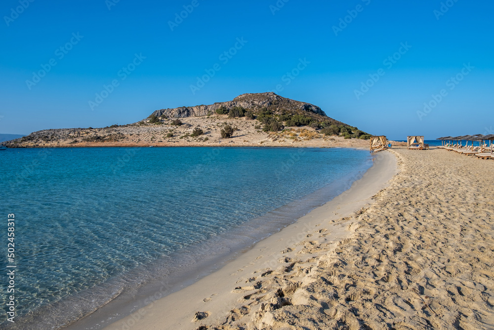 Sandy beach, Elafonisos island, Greece. Sea water turquoise color, white sand, clear blue sky