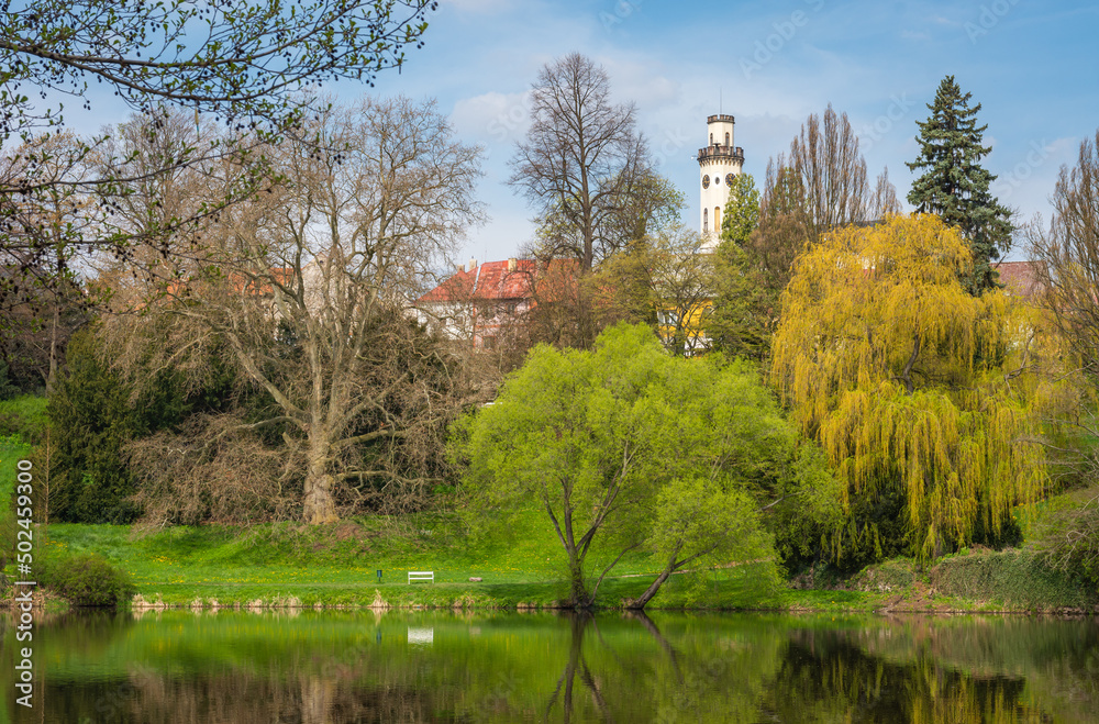 Tower of the town hall of Klasterec nad Ohri with the castle park and river Ohre in the foreground