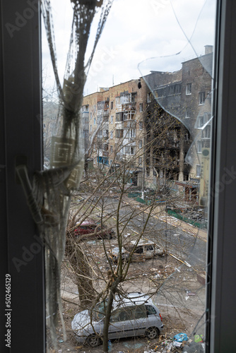 War between Russia and Ukraine. View from the window to the burnt house