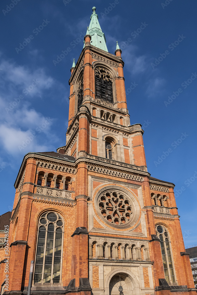 Protestant St John's Church (Johanneskirche, 88 m high tower) in the square of Martin-Luther place. Church built from 1875 to 1881 in Romanesque Revival style. DUSSELDORF, GERMANY.