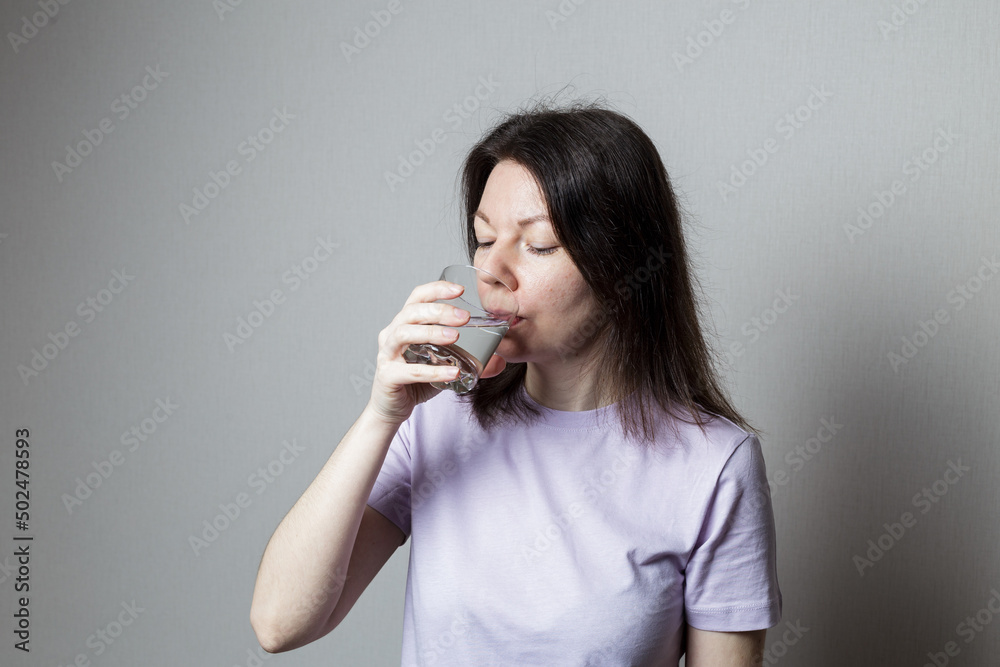 woman drinks clean water. health concept woman drinks clean water. health concept