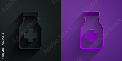 Paper cut Sedative pills icon isolated on black on purple background. Paper art style. Vector