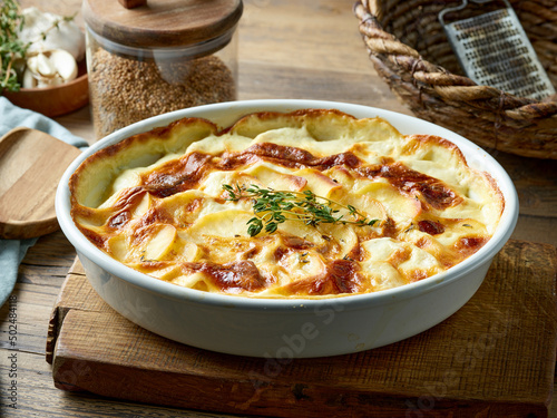 Photography bowl of freshly baked potato gratin