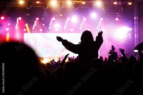 Raised hands of the fan during a concert.