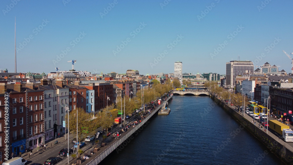 Aerial view over the city of Dublin and River Liffey - drone footage