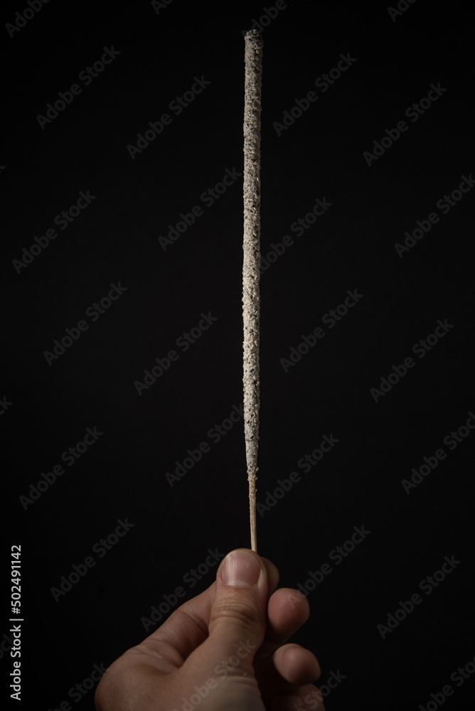 Fototapeta premium Mexican copal incense sticks on black background