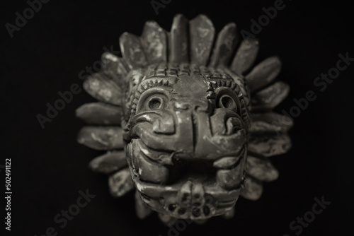 Macro close up photograph of a Quetzalcoatl, deity in Aztec culture