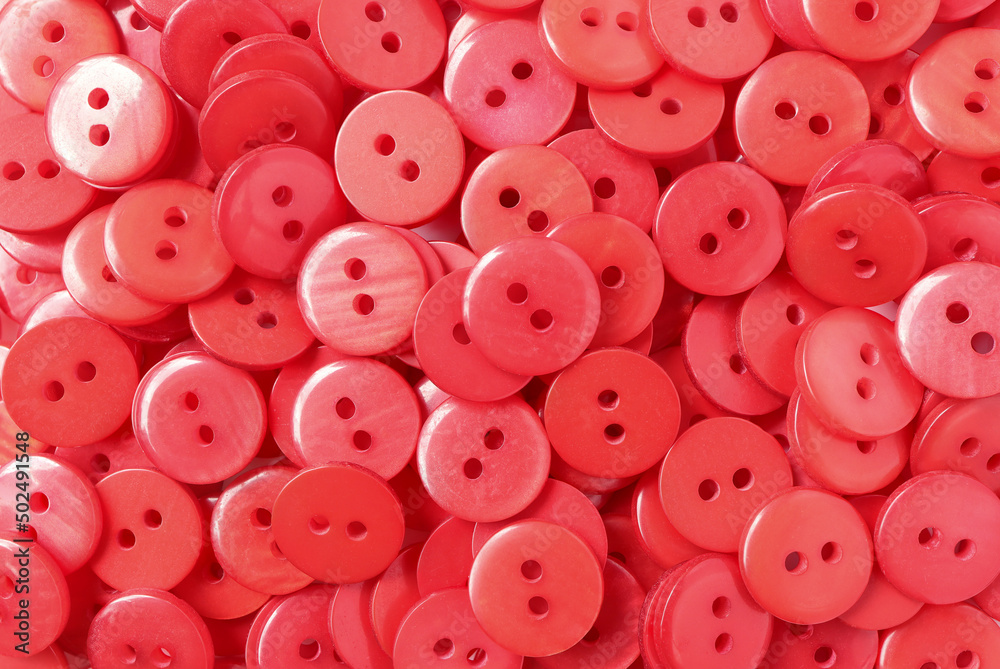 Red buttons background, Sewing buttons on white background. concept craft and needlework. Red buttons background, Sewing buttons on white background. concept craft and needlework.