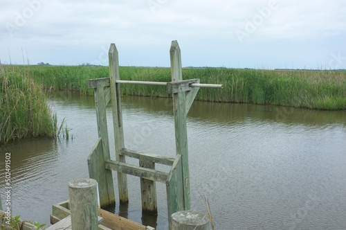 Trunk on a Santee Delta canal near Georgetown, South Carolina. Trunks are large water-control devices used for regulating water levels on tidal rice fields. 