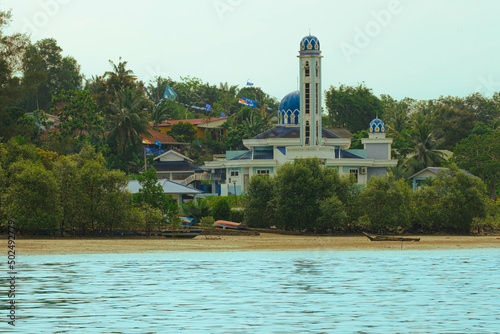 A mosque near a beach and mangrove swamp in Teluk Sengat, Johor, Malaysia photo