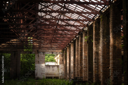 Old abandoned industrial building interior 