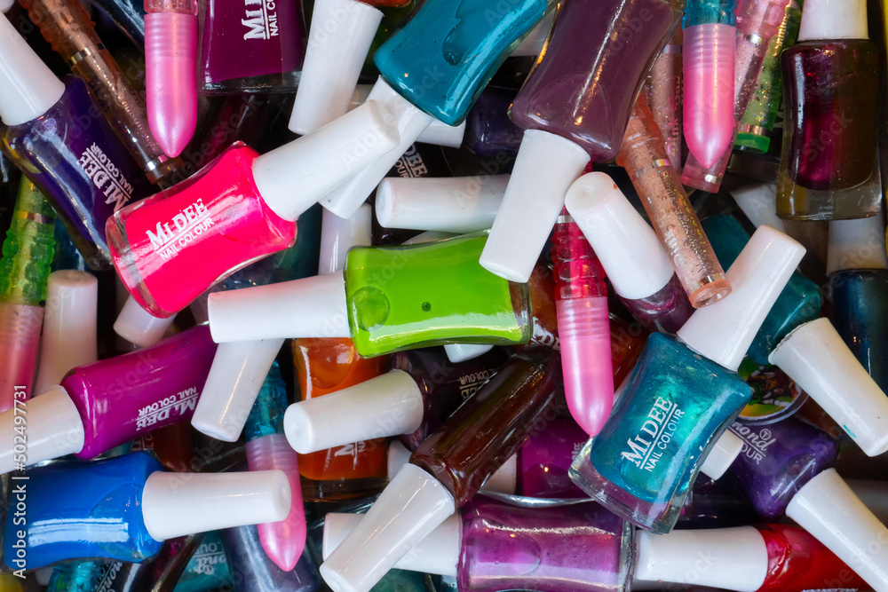 Kalighat, Kolkata, West Bengal, India - October 16th 2018 : Colourful nail polishes are on display for sale to women. Kalighat, Kolkata, West Bengal, India - October 16th 2018 : Colourful nail polishes are on display for sale to women.