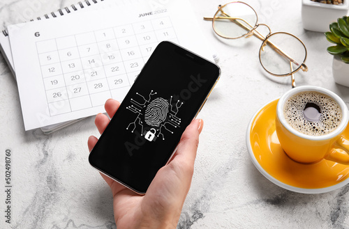 Woman with smartphone using...