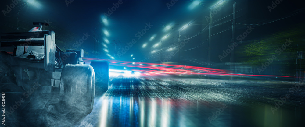Modern fast racing car on night city street