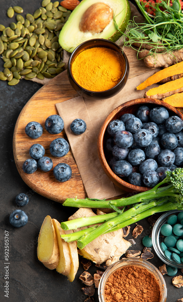 Healthy food clean eating selection on dark background. Healthy food clean eating selection on dark background.