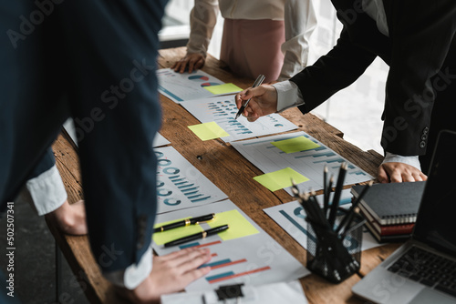 Canvas Print businessman and businesswoman talking discussion in group meeting at office table in a modern office interior